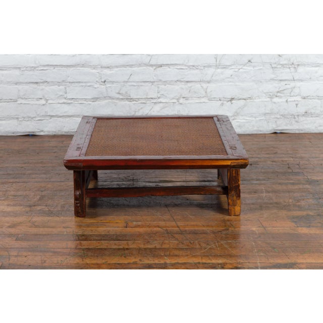 19th Century Chinese Qing Dynasty Dark Red Lacquer & Rattan Top Coffee Table For Sale In New York - Image 6 of 13