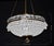 An elegant French Art Deco crystal basket chandelier dating to circa 1930, distinguished by its elaborate arrangement of...