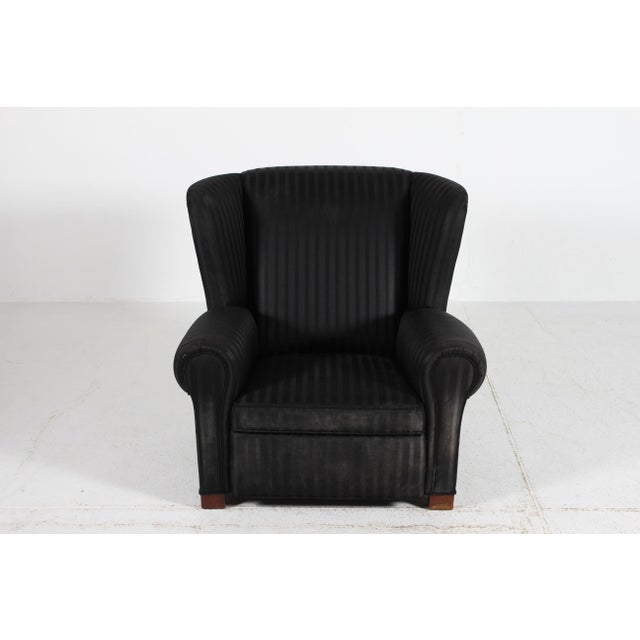 Large impressive and comfortable Fritz Hansen style Danish Art Deco lounge chair made in the 1930s. It's upholstered with...