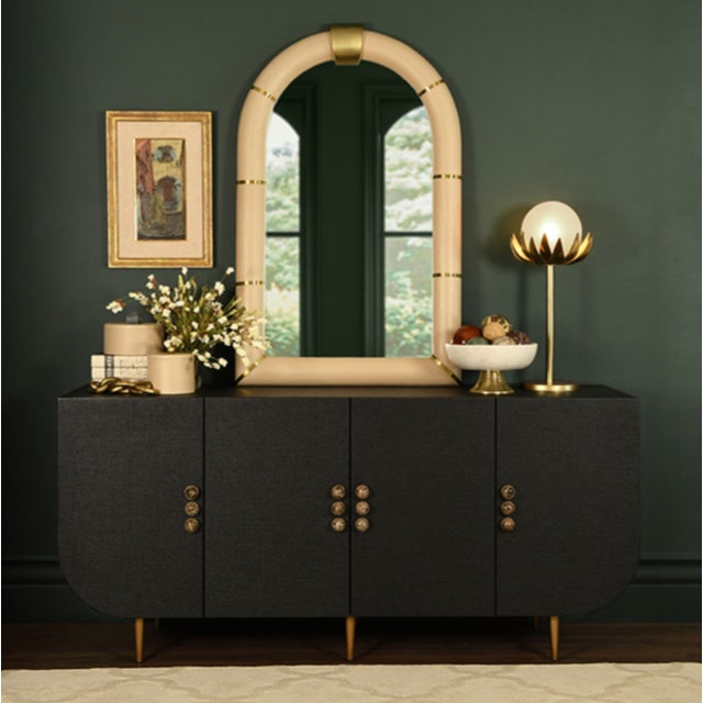 New special order item. Not vintage. Sleek storage meets style with this four-door buffet featuring charmingly rounded...