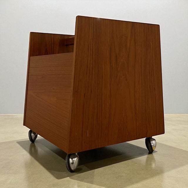 Mid-century teak storage rack by rolf hesland | bagn møbelindustri, norway | c. 1960s this mid-century storage rack was...