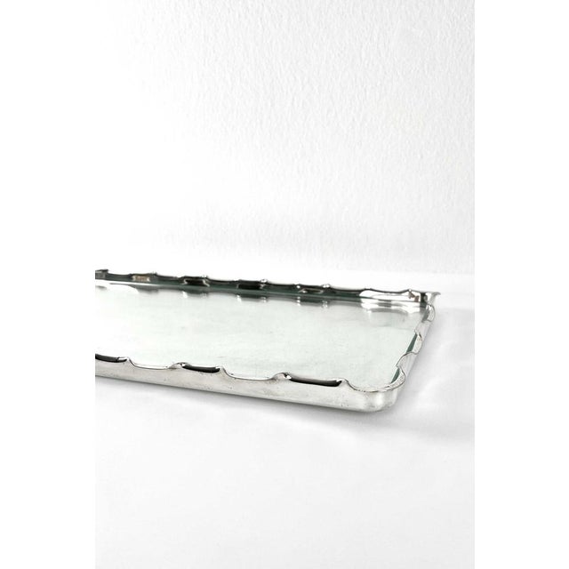 Material silver-plated metal, glass Dimensions Length: 55 cm, width: 22 cm Origin Switzerland Dating midcentury