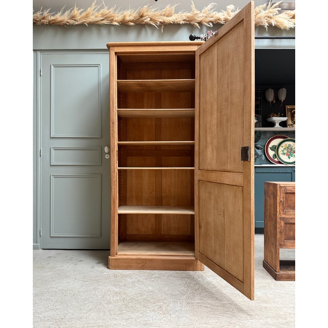 Authentic and full of charm, this large antique gouffé jeune wardrobe in solid oak captivates with its simple lines and...