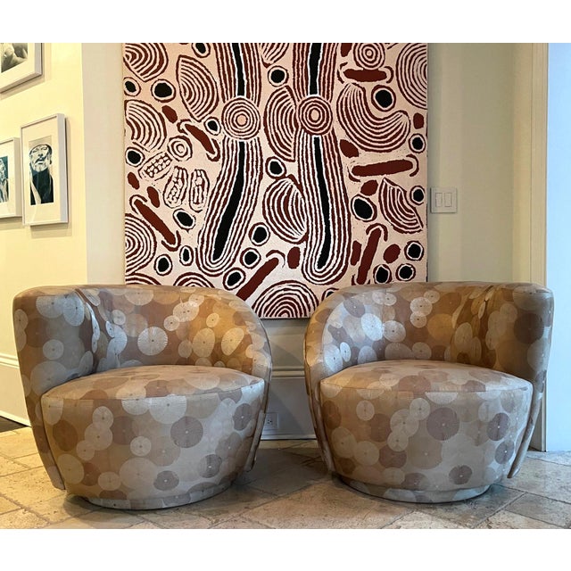 A pair of "Nautalis" armchairs in complementary mirrored composition attributed to Directional which in 1999 merged under...