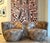 A pair of "Nautalis" armchairs in complementary mirrored composition attributed to Directional which in 1999 merged under...