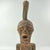 This intricately carved Songye standing figure exemplifies the distinctive artistic style of the Songye people,...
