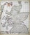 This double-page etching with contemporary coloring, entitled Scotia Regnum, was realized by the cartographer Frederick de...