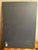 Vintage rectangular frameless wall mirror, with a wide bevel all around.