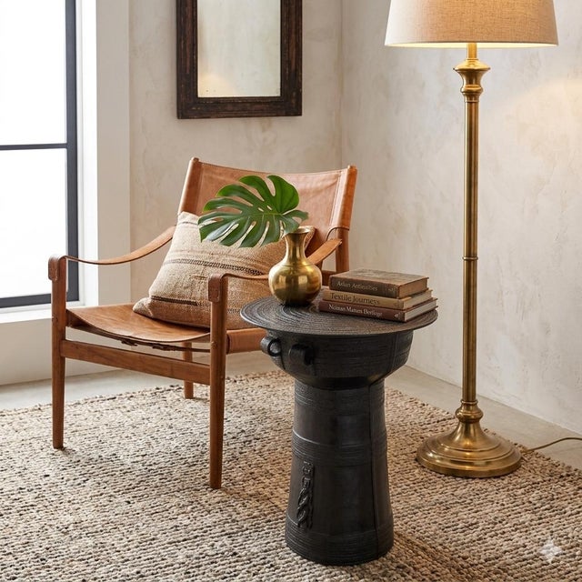 A striking vintage indoor-outdoor rain drum accent table. These tables are modeled directly after bronze percussion...