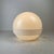 Elegant Space-Age table lamp crafted in white translucent methacrylate, featuring two interlocking hemispheres that form a...