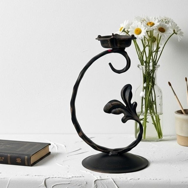A Touch of Eternal Spring: Illuminate with the Verdant Candlestick. Infuse your home with the timeless vitality of nature...