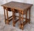 20th Spanish walnut nesting tables with turned legs Carved and turned side tables. The set has a rectangular table with...