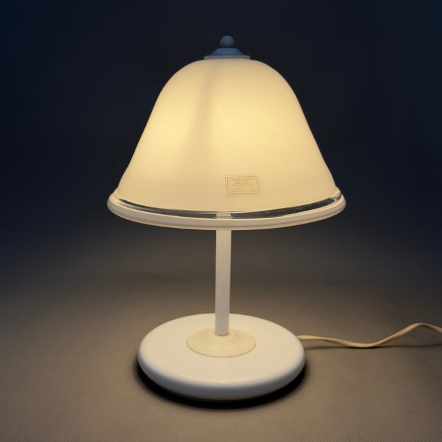 This Space Age icon captures the futuristic aesthetic of Italian modernism, ideal for enhancing living areas or...