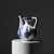 The Fluted Ewer: Sculptural Elegance in Miniature Add a touch of vintage sophistication to your home with this Handmade...