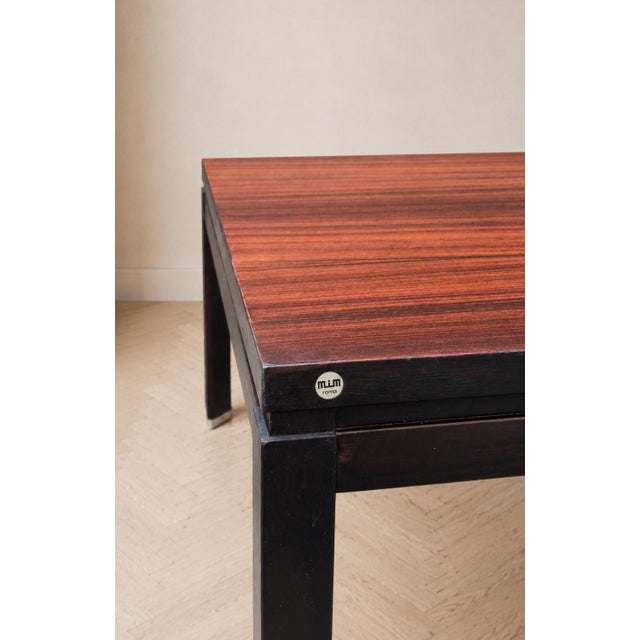 Elegant square coffee table manufactured by mim roma, dating approximately from the 1960s and representative of post-war...