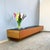 A unique and elegantly elongated lowboard with three handle-free drop-down compartments. This piece of furniture impresses...