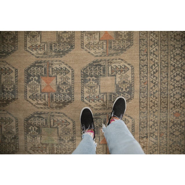 :: Triple column repeating elephant footprint floral gul motif wrapped by multi-layered borders in geometric snowflake...