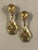 This fabulous pair of 1970s Trifari Gold Art Deco Dangle Earrings is sure to garner lots of oohs and aahs. The...