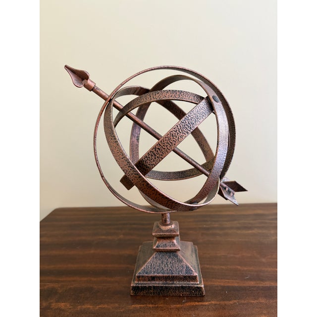 A stunning vintage English country or Neoclassical style hammered copper garden armillary sundial USA, Late 20th Century...