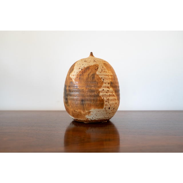 Lovely vintage ceramic vase in the manner of Toshiko Takaezu. Really great closed form with a tiny open. Top is...