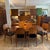 A striking mid-century modern dining set from the coveted “Delineator” line, designed by Paul McCobb for Lane Furniture,...