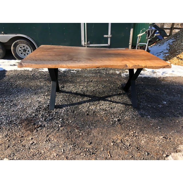 Incredible large handcrafted live edge Ash dining table in a gorgeous blonde color with stunning grain and character....