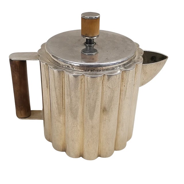 Art Deco silver plated teapot attributed to Ilonka Karasz, c. 1928. A sculptural modernist design with vertical fluting,...