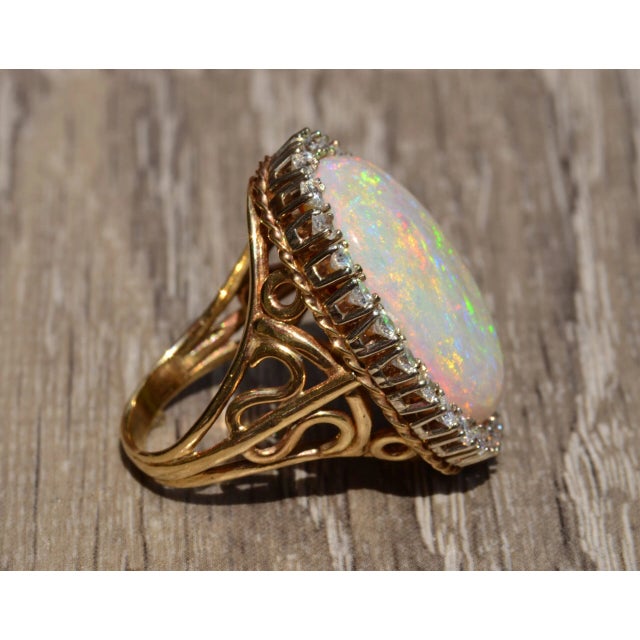Metal The Lilly: Impressive 14 karat yellow and white gold ring set with a 22 carat Australian opal and diamonds For Sale - Image 7 of 11
