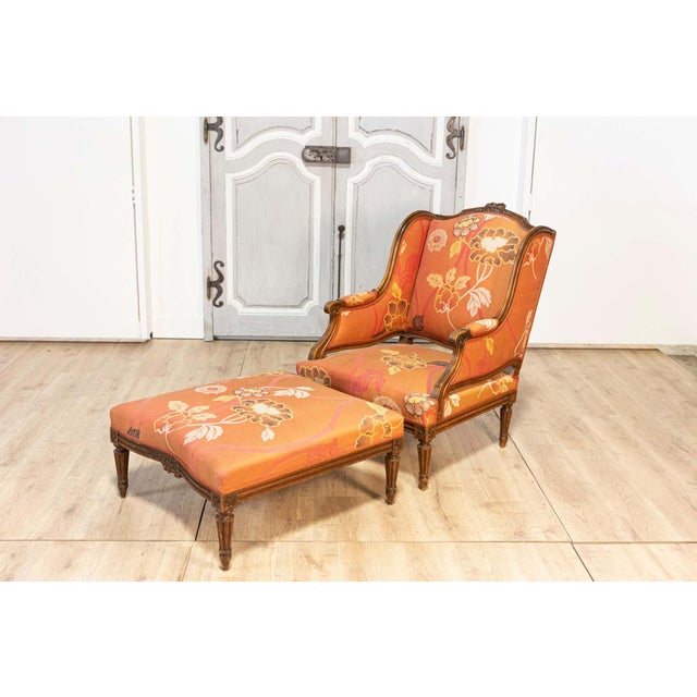This elegant 20th-century French walnut chair and ottoman set exemplifies the timeless charm of traditional French design....