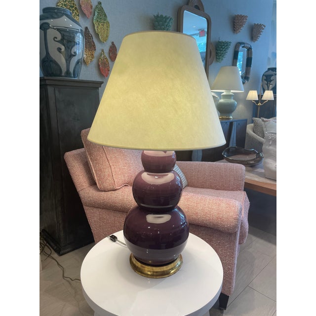 A timeless statement piece from renowned ceramic artist Christopher Spitzmiller, this Large Three Ball Table Lamp...
