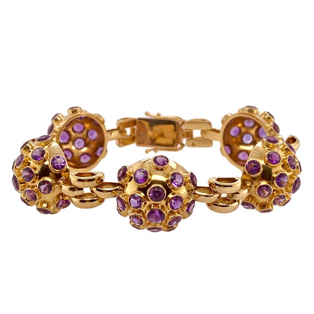 A fine, vintage, 18K gold and amethyst "Sputnik" bracelet in the style of H. Stern. The bracelet tests 18K and the clasp...