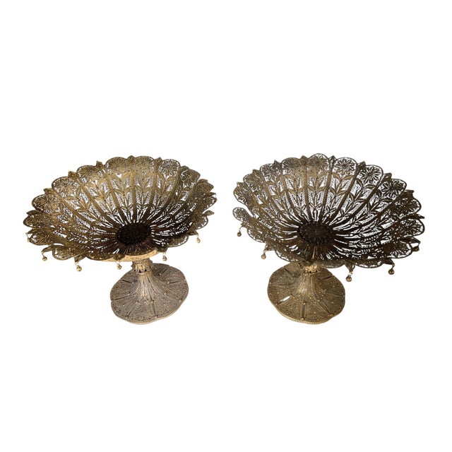 A pair of French bronze dore tazzas with an intricate filigree design throughout. Incredible workmanship. Circa 1890, France.