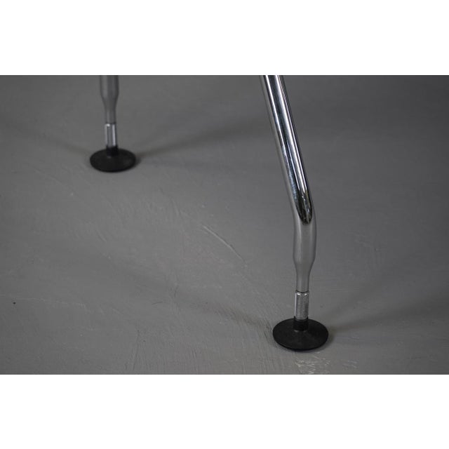 Designed by Antonio Citterio, the desk combines functional elegance with modern materials. Citterio, a renowned designer,...