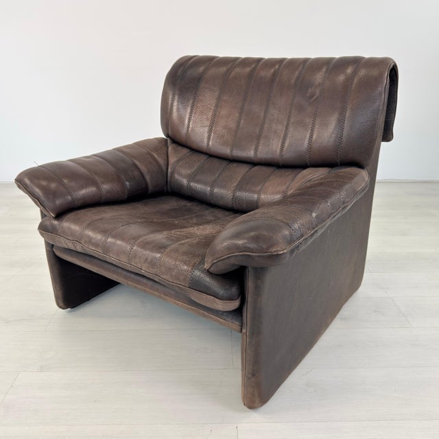 Dimensions: H 33” x W 36.5” x D 36” x SH 16” Vintage Swiss brown leather lounge chair model DS 86 from De Sede, 1970s....