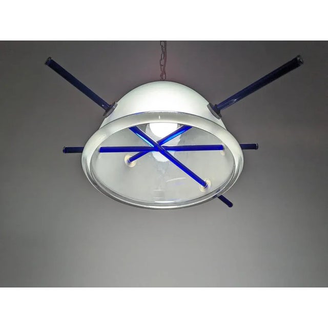 Italian lamp with a spectacular design with murano glass in cobalt blue that highlights its full color when it is on while...