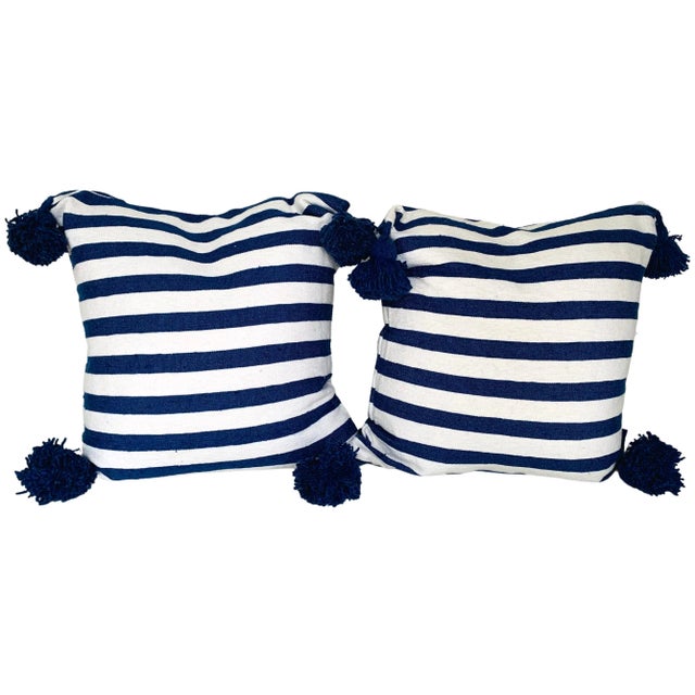 Pair of Moroccan handloomed navy and white cotton pom pom pillows with zipper closure New duck feather-and-down fill...
