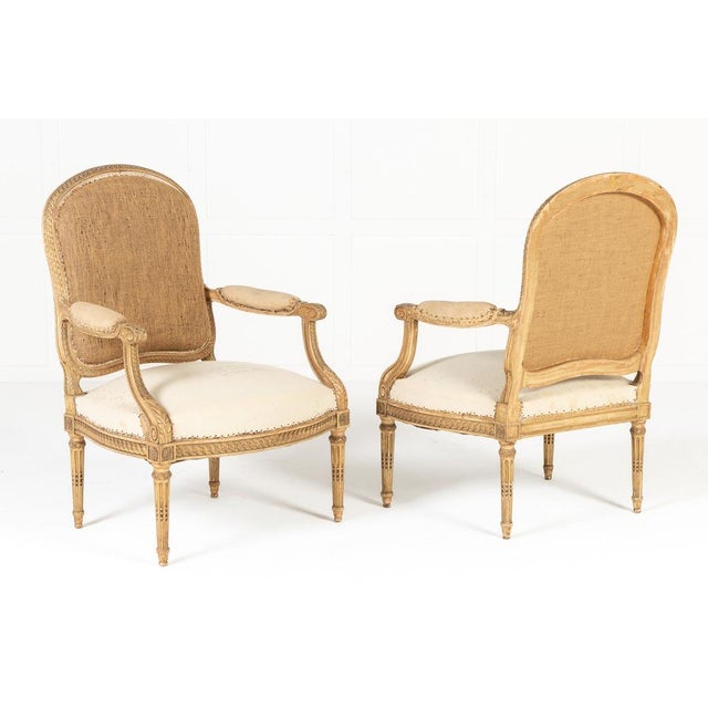 Pair of 19th century french giltwood armchairs these armchairs are gilded throughout and stand on turned and carved legs...