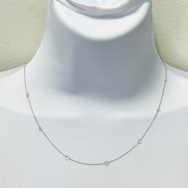 Beautiful 1.06 ct. white diamond round rose cuts. Handmade in 18k white gold. Length is 18". total of 10 stones.