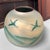 An elegant, handmade vase from Japan, crafted at the renowned Saikyū-gama kiln and signed on the underside with 彩玖窯製...