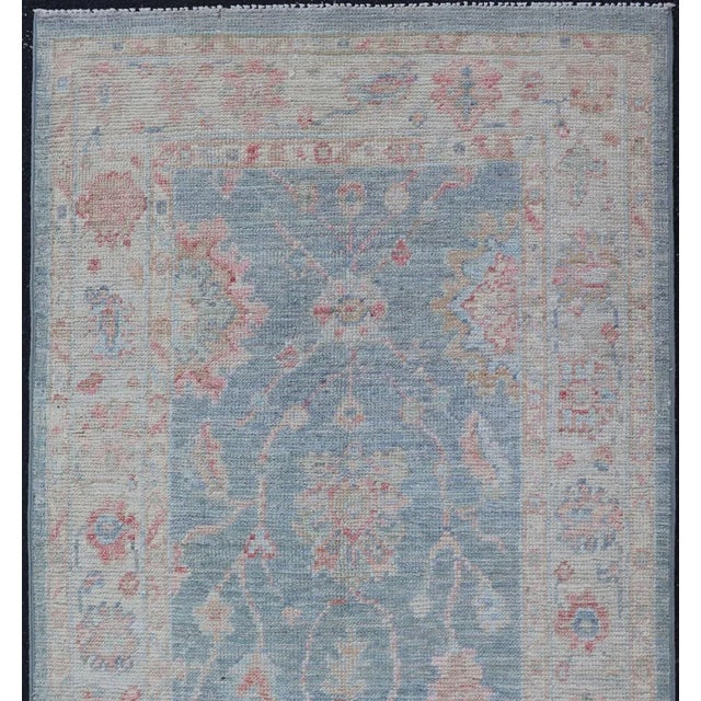 Measures:2'11 x 5'8 Modern Oushak Rug with a Light Blue Field With All-Over Floral Motifs With Cream. Keivan Woven Arts/...