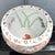 Beautiful vintage Chinese porcelain fish bowl featuring an elaborate hand-painted design in a soft famille rose-inspired...