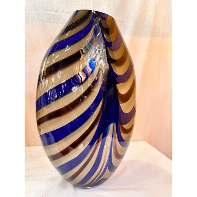 Artistic vase in Murano glass with colored reeds . Geometric design in very particular movement and effect. Unique piece...