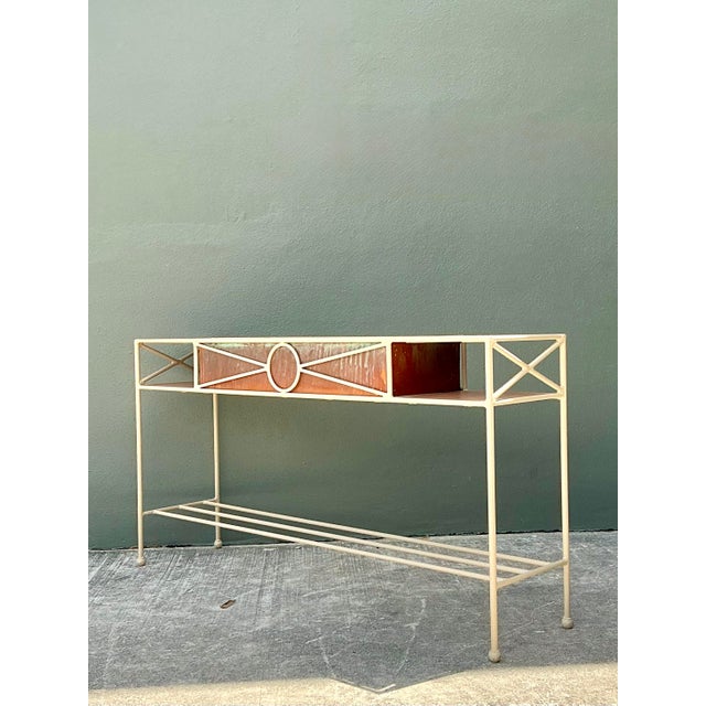 This elegant vintage Neoclassical dry sink console is a sophisticated fusion of architectural ironwork and organic...
