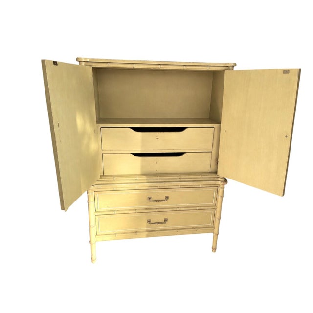 Made in USA. 9-Drawer Henry Link Bali Hai style armoire cabinet on chest in good, clean vintage condition. A very...