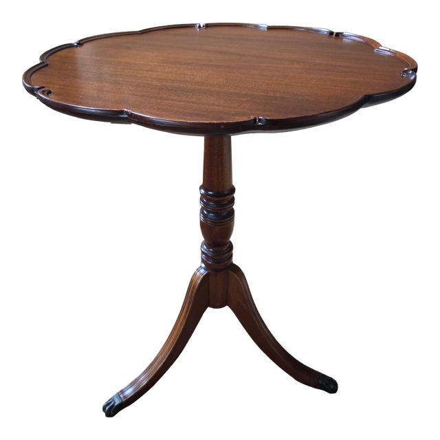 Mid 20th Century Pie Crust Tilt Top Table With Turned Tripod Base Brass Claw Feet For Sale
