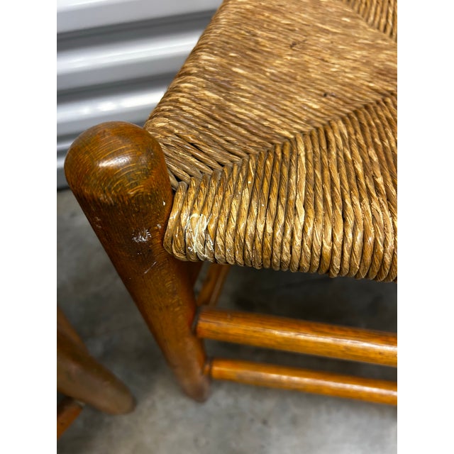 Lovely, petite ladder back chairs with rush seats.