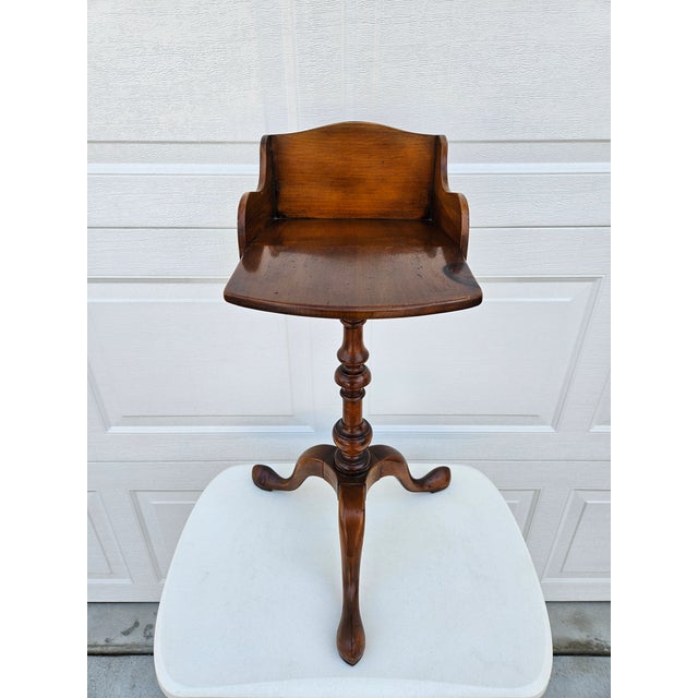 A gorgeous pine chairside bookstand by Pine Shop Original out of Michigan. This piece is on a pedestal. The interior...