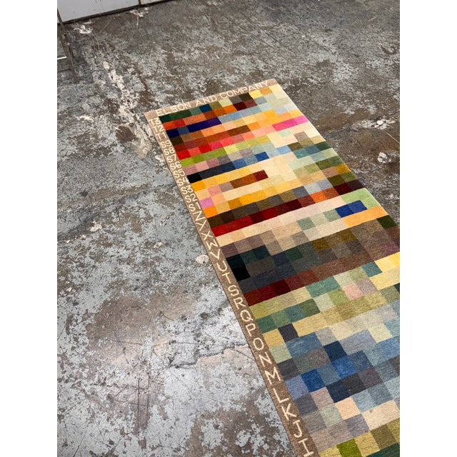Design Plus Gallery presents the 2ft 2in × 6ft 8in Color Chart Runner Rug by Elson & Company. This hand-knotted wool...