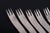 Arne Jacobsen for Anton Michelsen, set of six dinner forks. Set of six stainless steel dinner forks featuring Arne...