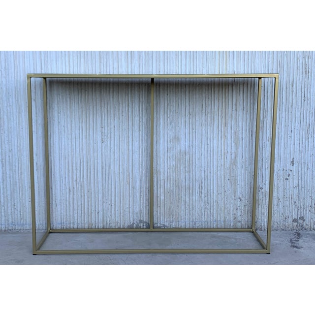 New gilded iron console table with metal top. Galvanized metal rod shelving with epoxy powder coating.